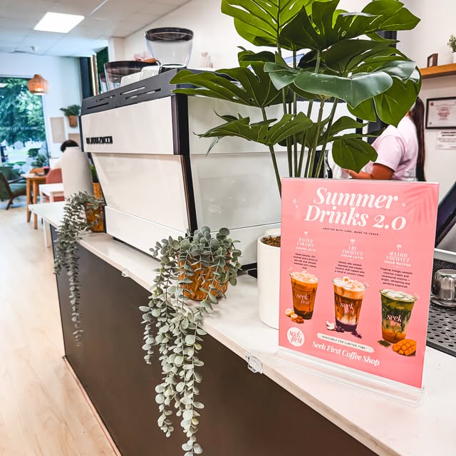 Colorful cafe counter and in-store atmosphere at Seek First Coffee Shop