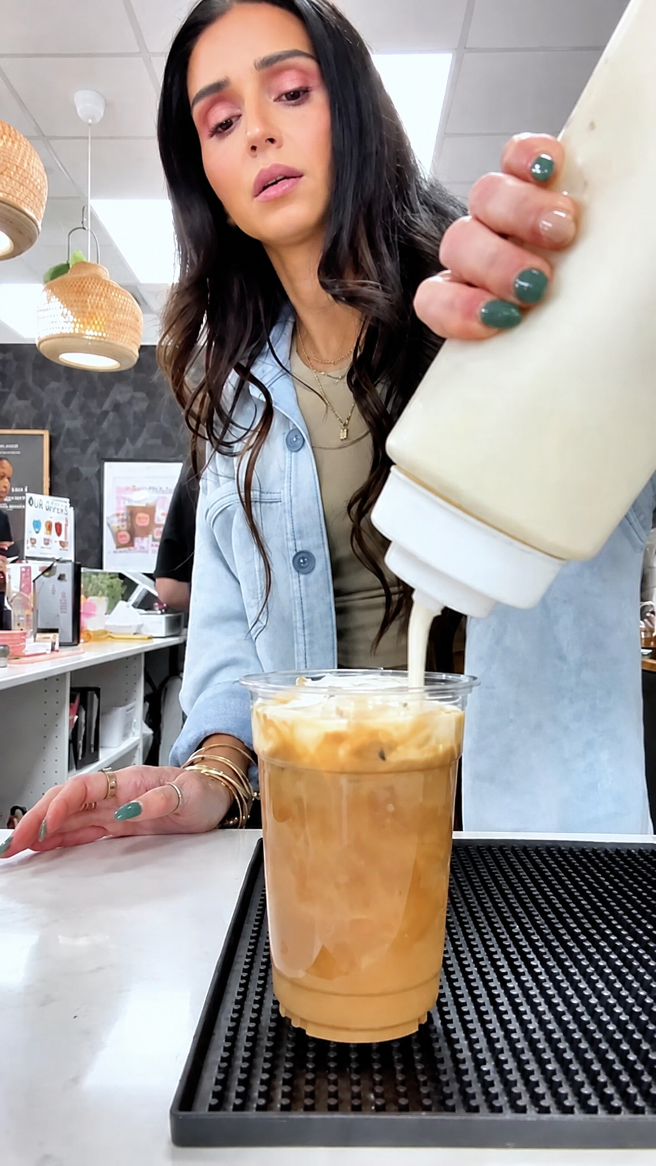 Drink preparation at the cafe counter